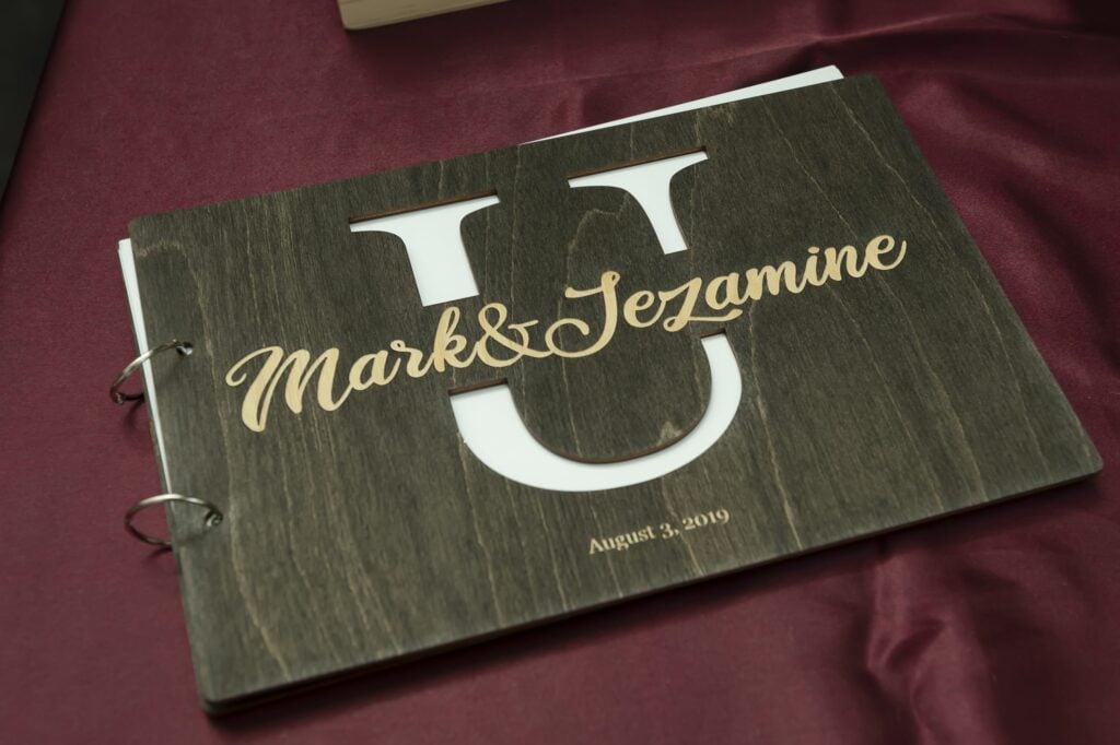 A custom-made guest book with a monogram of their last name.