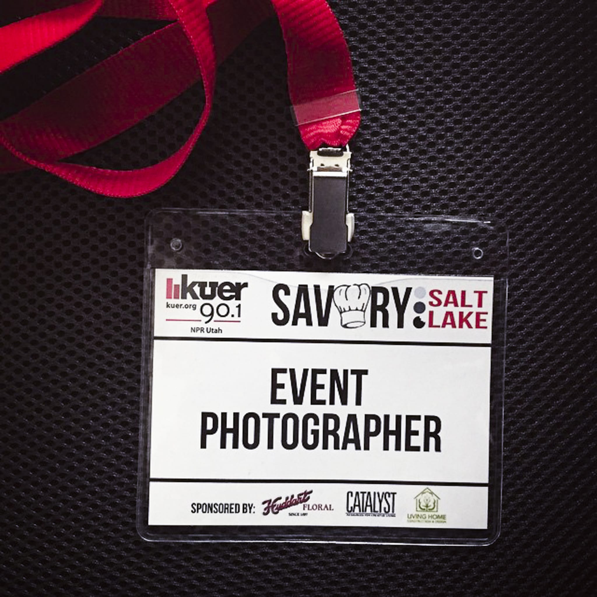 A bade and lanyard for an event photographer at Savory Salt Lake.