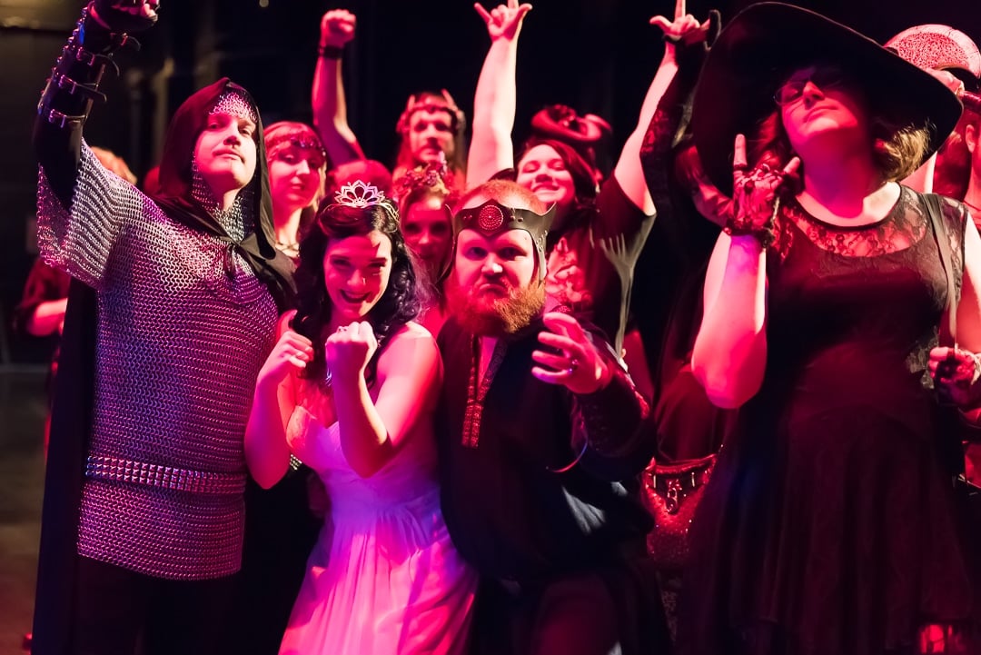 On stage moments with red lights during the performance of Visigoth at the wedding of Henry and Eleora.