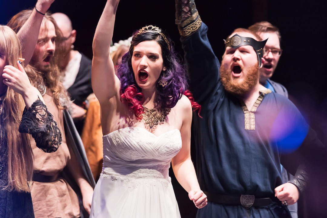 The bride and groom enjoy the music of Visigoth at their D&D heavy metal wedding.