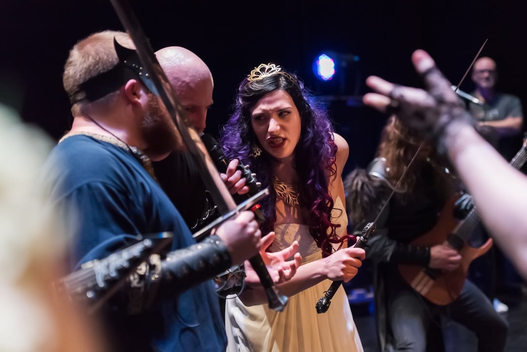 The bride and groom with the band Visigoth at their heavy metal, D&D themed wedding.