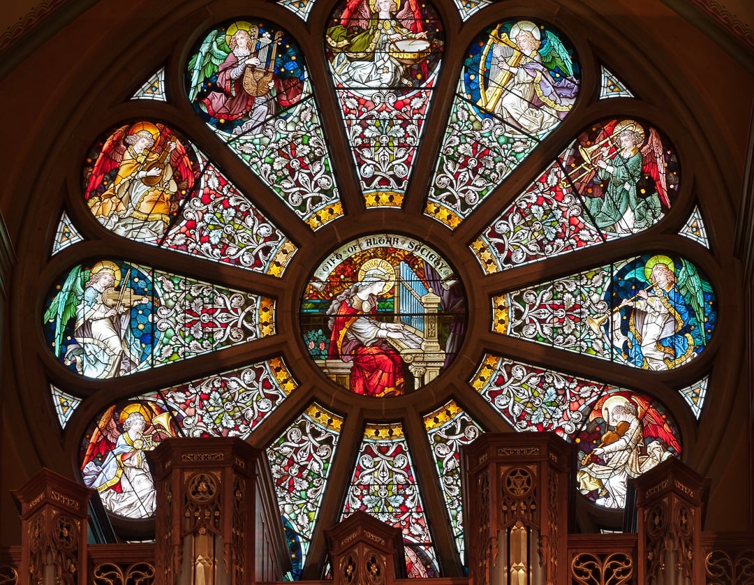 A large stained glass window at a cathedral.