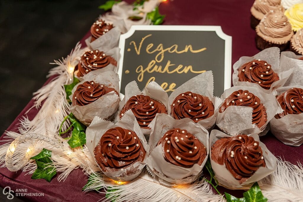 Vegan and gluten free cupcake options at the cake table from Rheinlander Bakery.