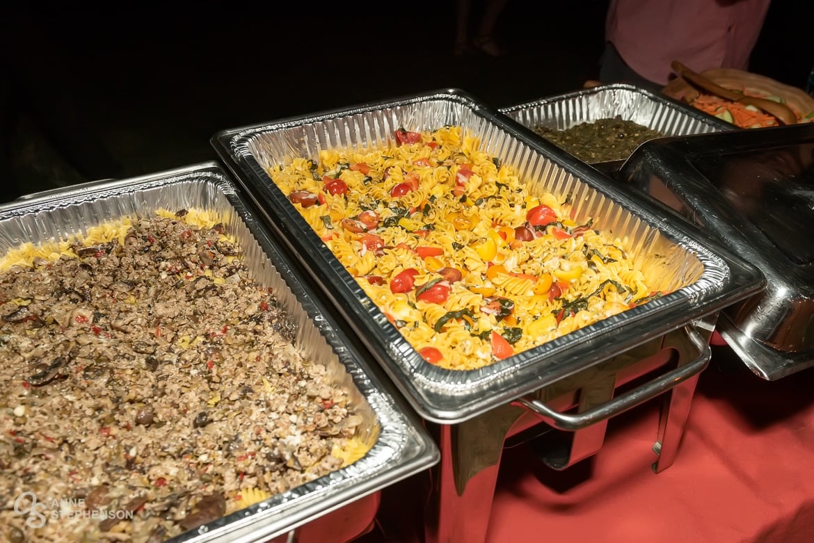 The food, including this pasta salad with tomatoes and ribbons of basil, was prepared by the bride's best friend.
