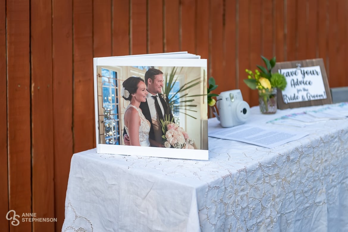 A table displaying the bride and groom's wedding album