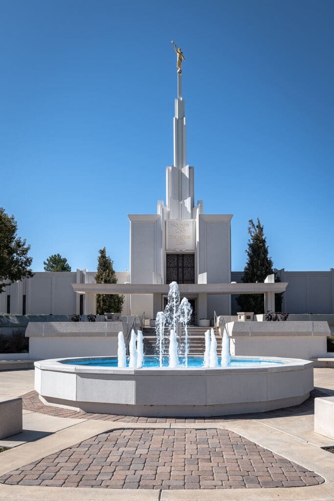 Exterior view of the Denver Temple Church of Jesus Christ of Latter Day Saints with fountain in foreground.