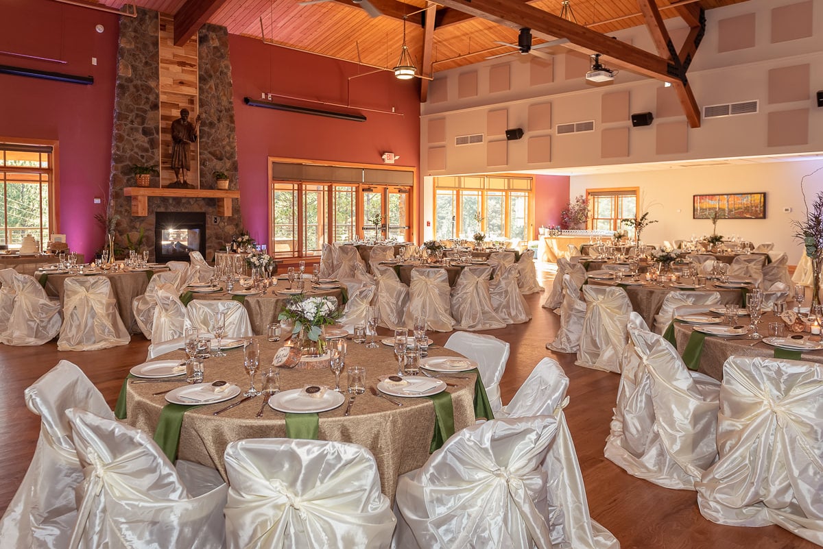 Beautiful uplighting at a wedding reception held at Christ the King Catholic Church in Evergreen.