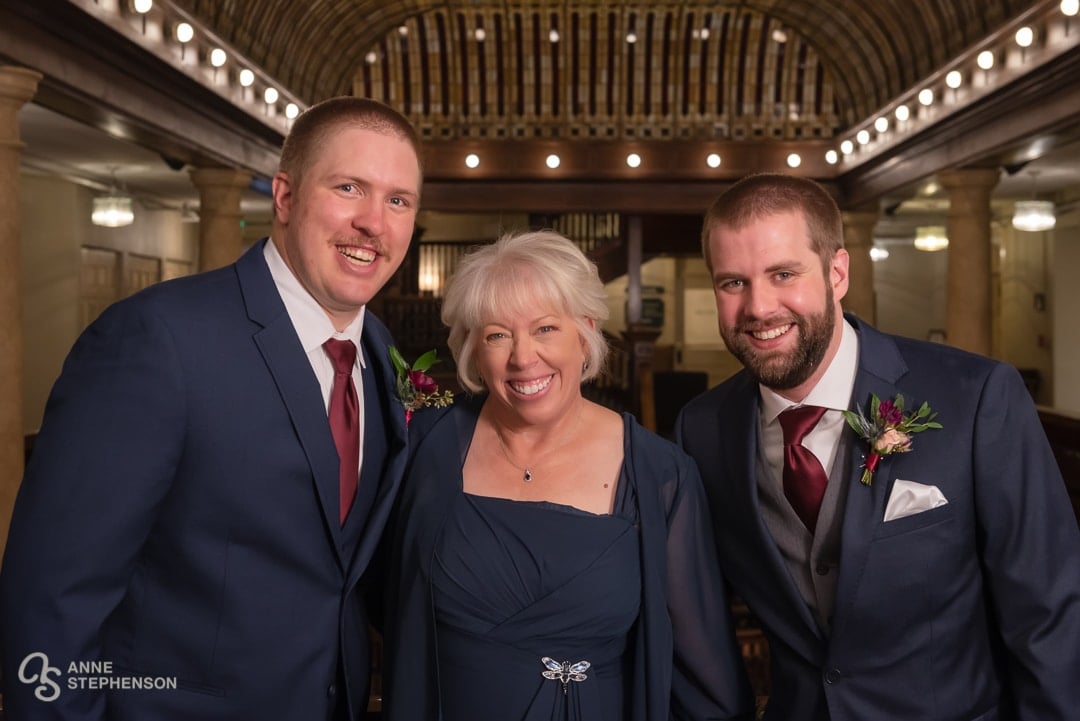 The groom, his brother and their mother.