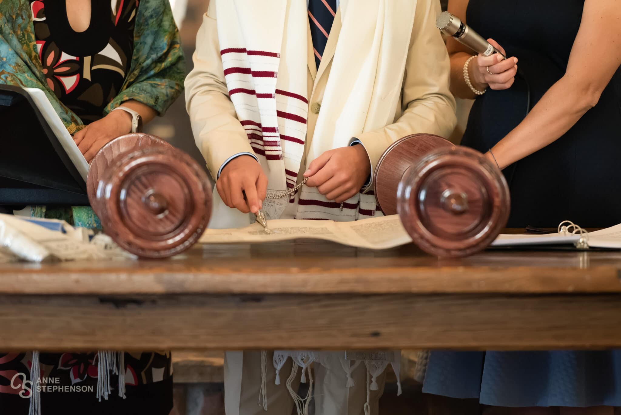 Close up view of the yad during the reading of the Torah at a Bar Mitzvah.