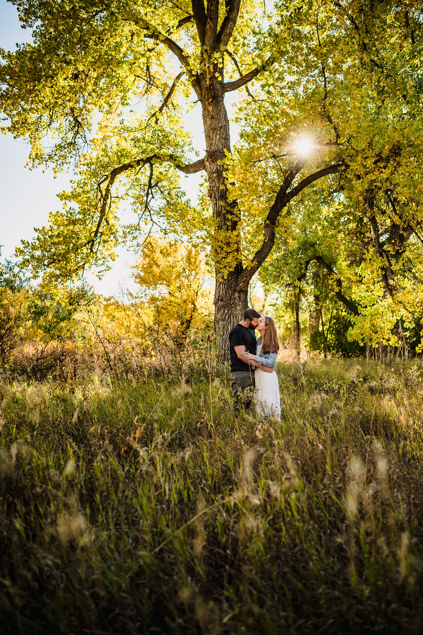 The best engagement sessions in Denver happen in the autumn with golden leaves.
