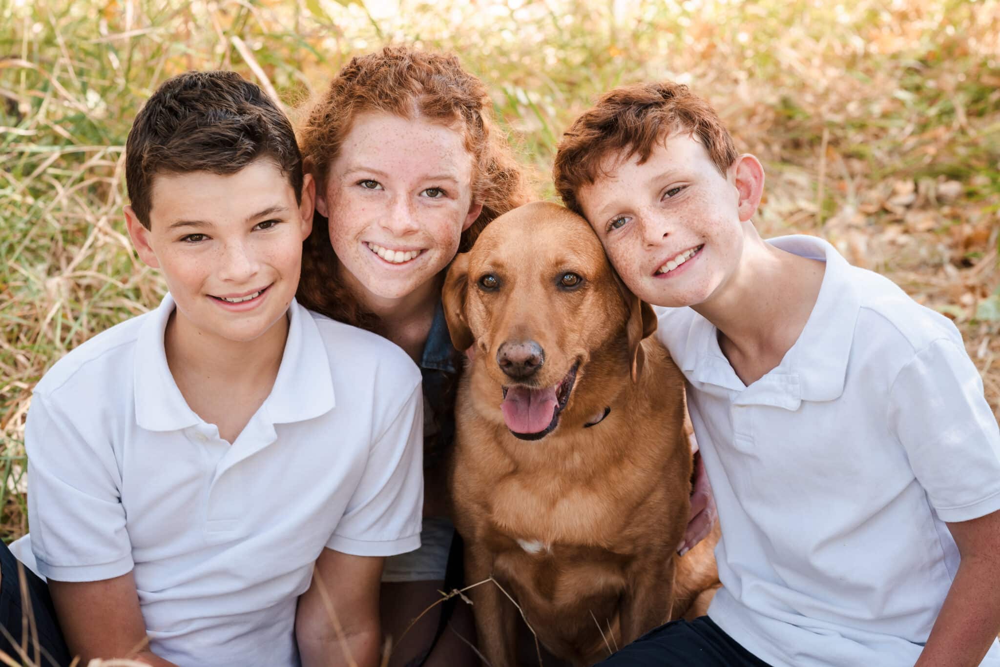 The best family portrait session includes a photo of all your babies, including the dog.