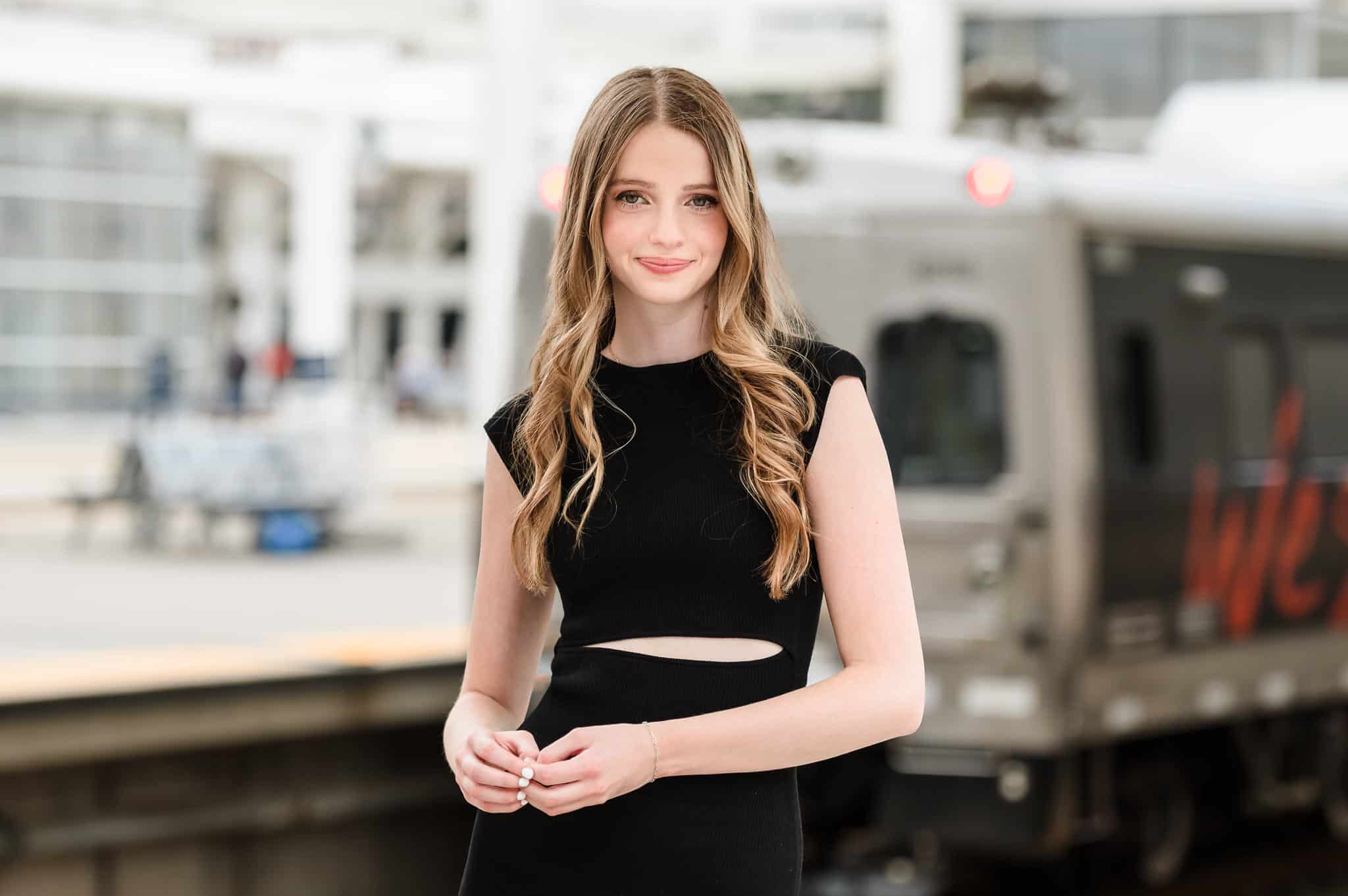 A young woman on the train platform at Union Station in downtown Denver, Colorado.