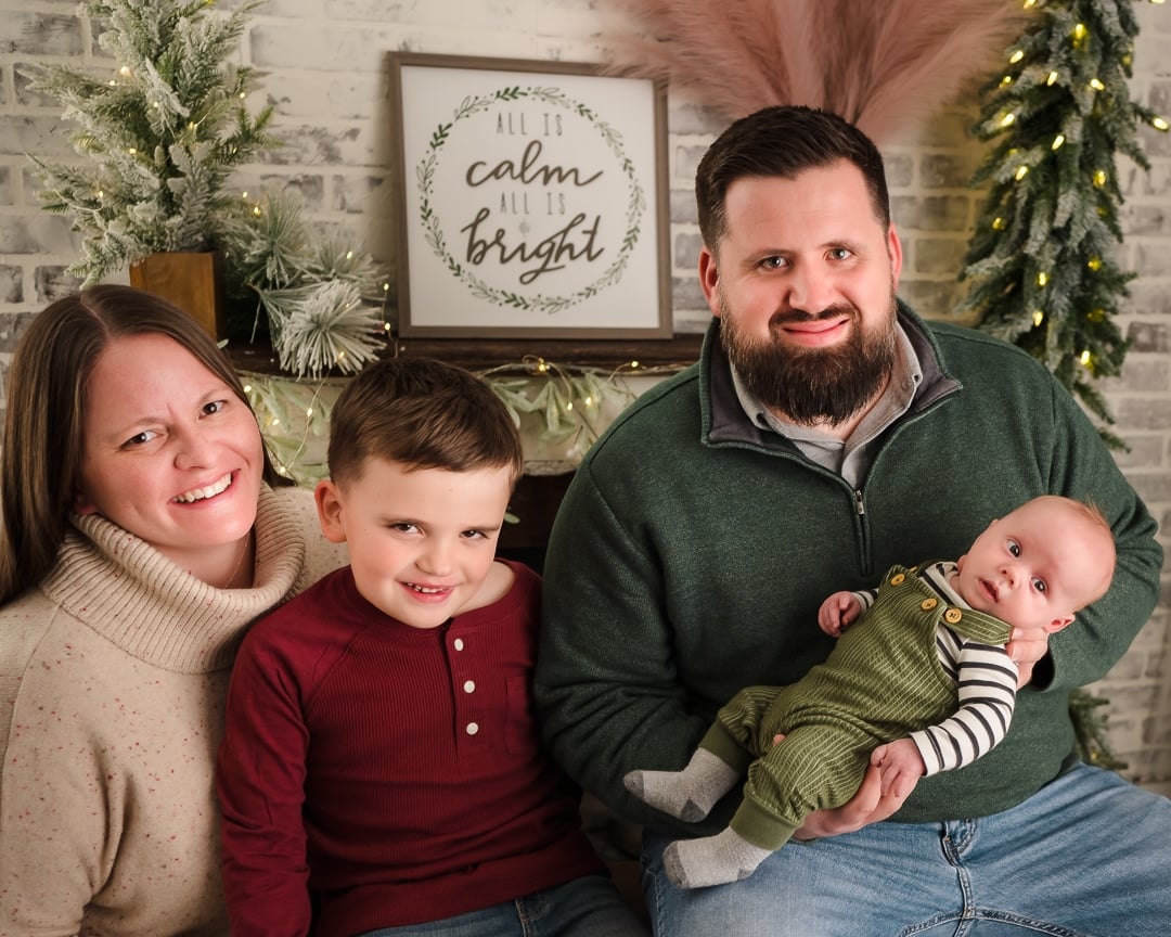 A smiling family at the Holiday Mini-Sessions Loveland
