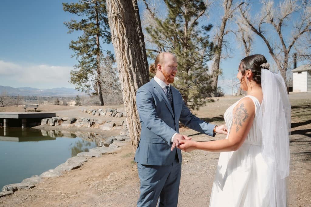 A man reacts to seeing his soon-to-be wife for the first time during their first look reveal.