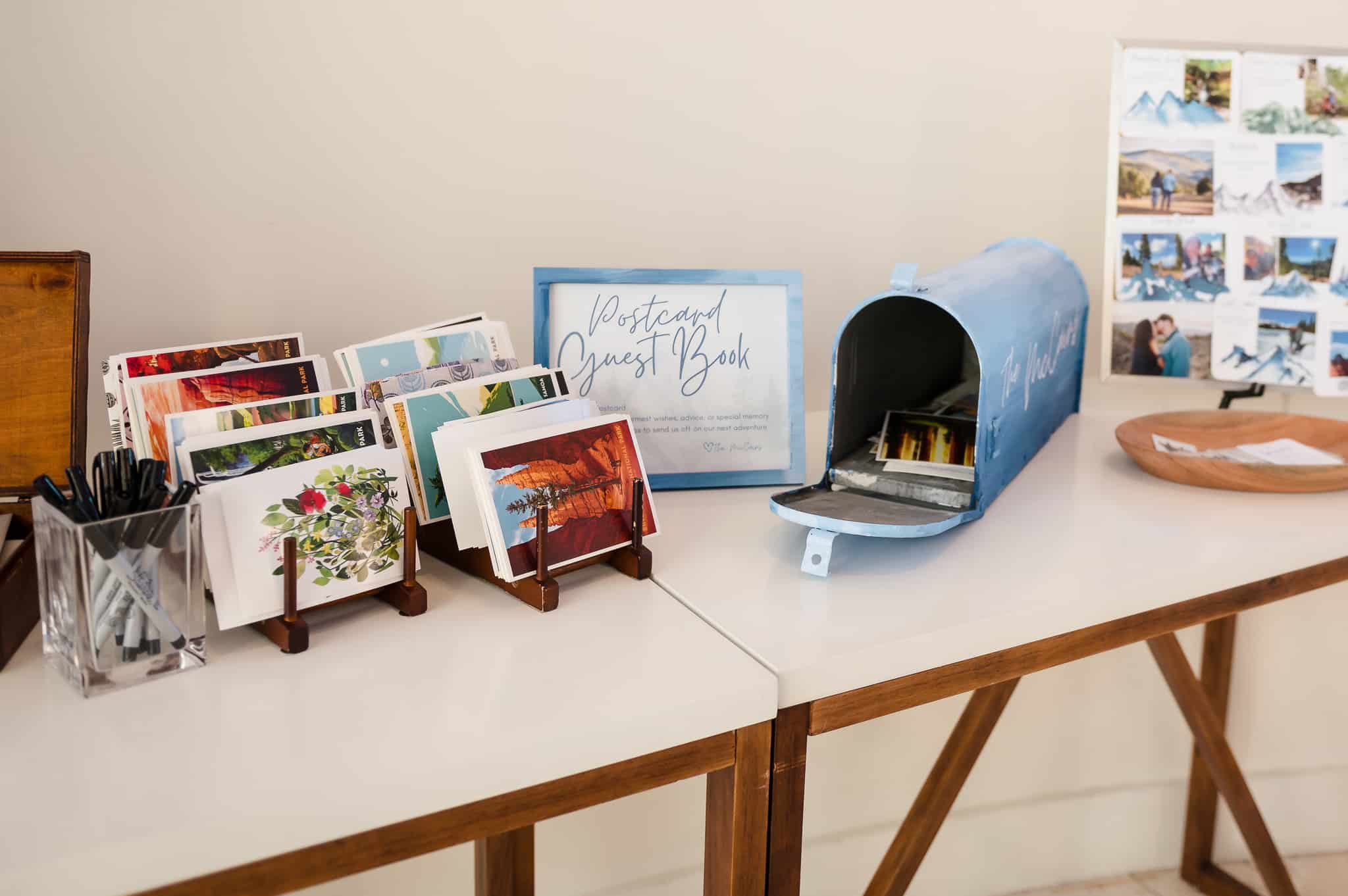 Instead of a traditional guest book, the bride and groom placed postcards for guests to sign with instructions to place cards in a nearby decorative mailbox. 