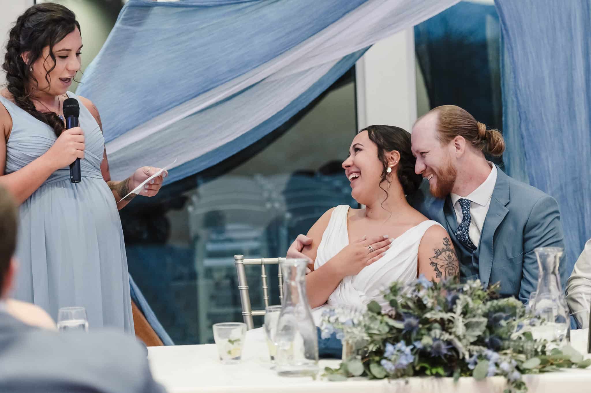 The sister of the groom gives an entertaining speech that touches the newlyweds.