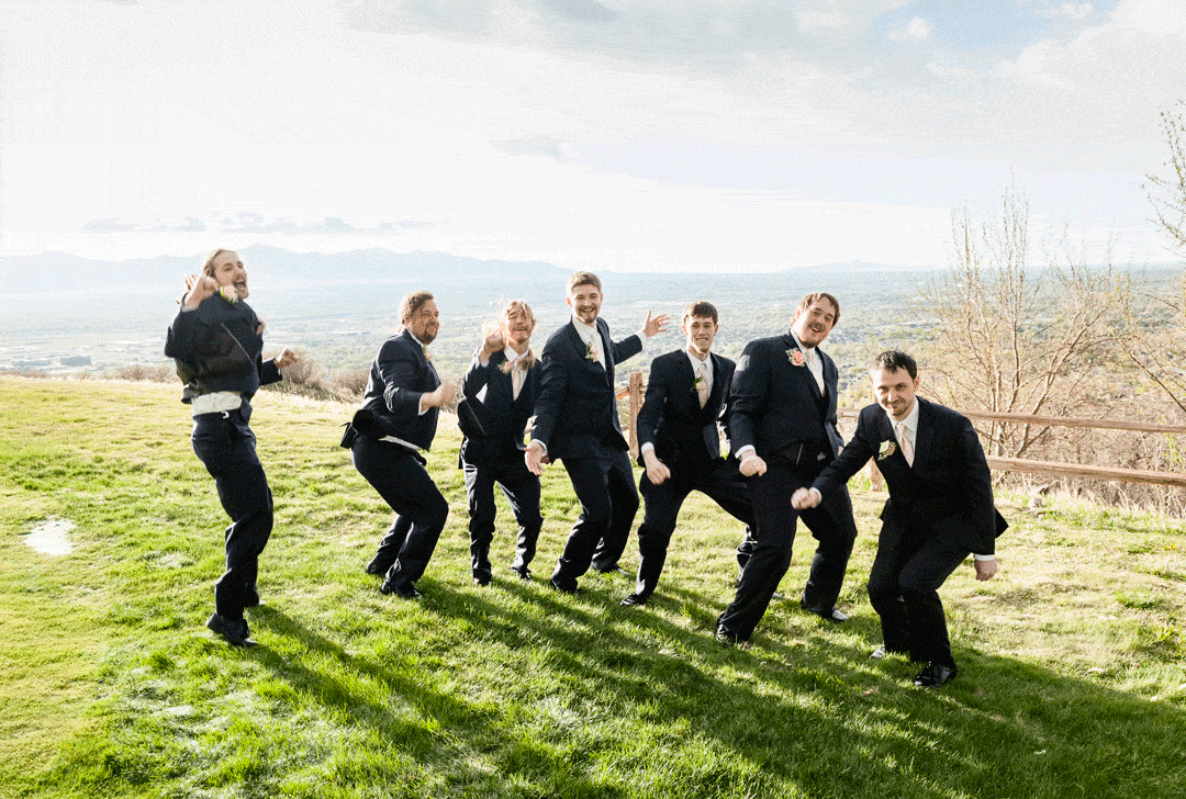 This animated gif shows the groom and his groomsmen jump with excitement at this golf course wedding.