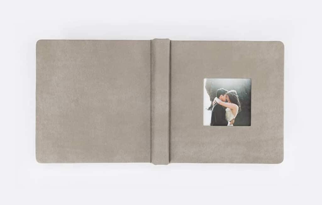 Overhead view of an photo book to show cameo cover insert.