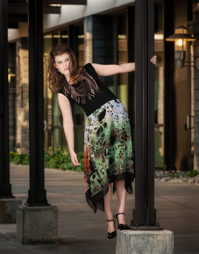 The graphic design of the skirt is shown off by the graphic architectural elements.