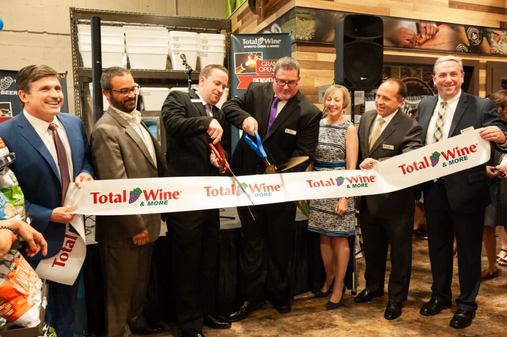 Colorado event photography of the official ribbon cutting with several executives from Total Wine.