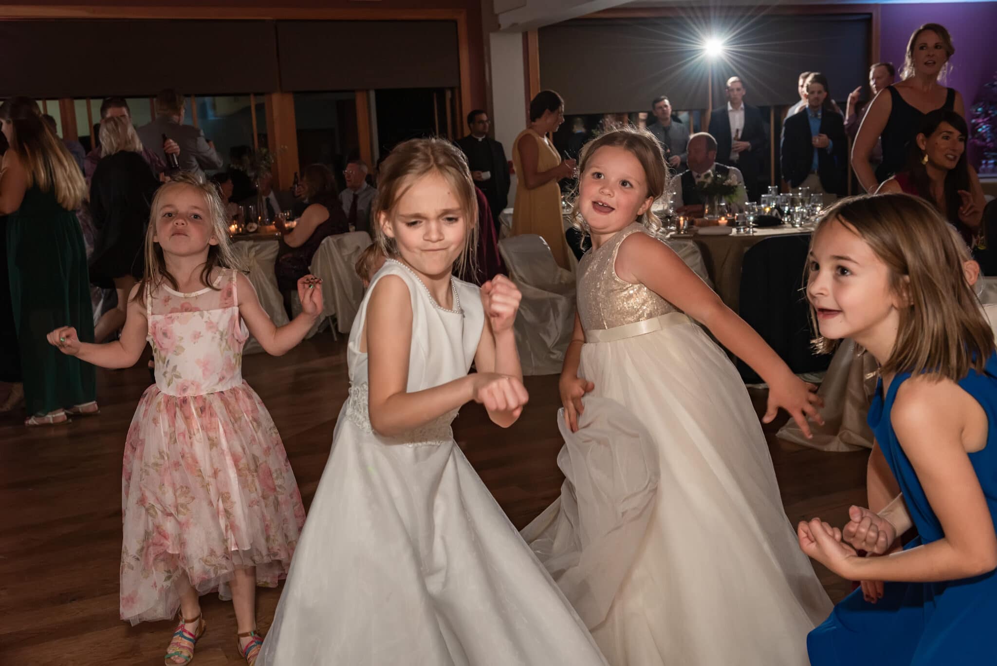 Flower Girls show off their best dance moves at a reception in Golden, Colorado.