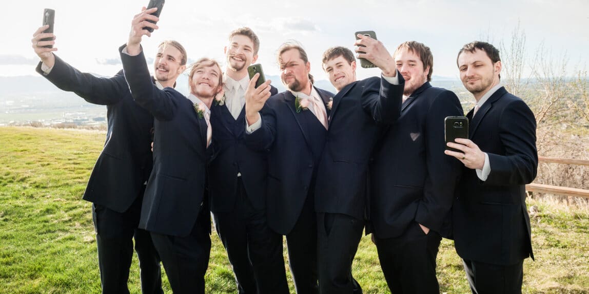 Groomsmen take selfies
